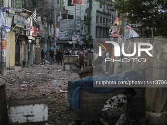 Pro-government student wing and anti-quota protestors are clashing in Dhaka, Bangladesh, on July 16, 2024. (