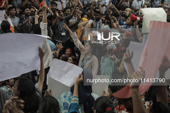 Anti-quota protestors are blocking the road following the death of fellow protesters during a clash with the pro-government student wing in...