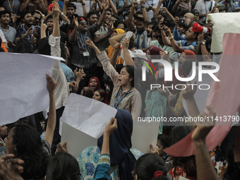 Anti-quota protestors are blocking the road following the death of fellow protesters during a clash with the pro-government student wing in...