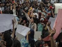 Anti-quota protestors are blocking the road following the death of fellow protesters during a clash with the pro-government student wing in...