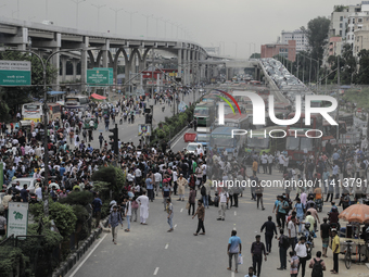 Anti-quota protestors are blocking the road following the death of fellow protesters during a clash with the pro-government student wing in...