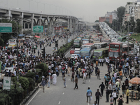 Anti-quota protestors are blocking the road following the death of fellow protesters during a clash with the pro-government student wing in...