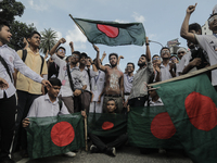 Anti-quota protestors are blocking the road following the death of fellow protesters during a clash with the pro-government student wing in...