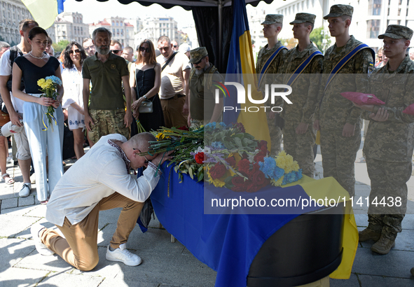 People are paying their last respects to the commander of the OUN volunteer battalion Mykola Kokhanivskyi, who died near Vovchansk in Kharki...