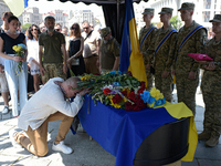 People are paying their last respects to the commander of the OUN volunteer battalion Mykola Kokhanivskyi, who died near Vovchansk in Kharki...