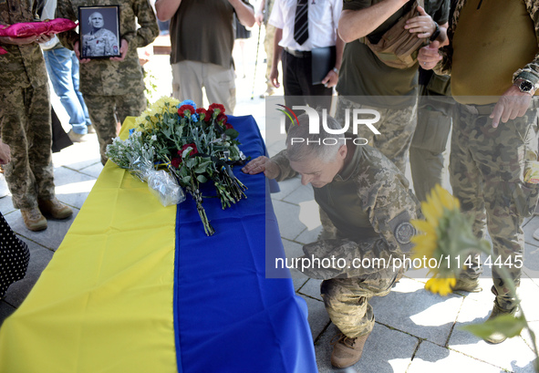 Servicemen are paying their last respects to the commander of the OUN volunteer battalion Mykola Kokhanivskyi, who died near Vovchansk in Kh...