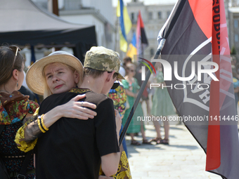 People are paying their last respects to the commander of the OUN volunteer battalion Mykola Kokhanivskyi, who died near Vovchansk in Kharki...