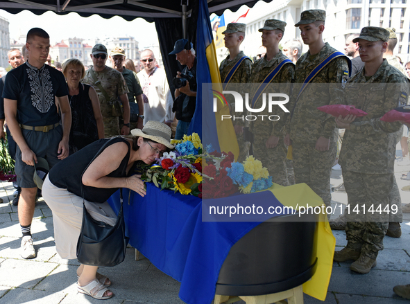 People are paying their last respects to the commander of the OUN volunteer battalion Mykola Kokhanivskyi, who died near Vovchansk in Kharki...