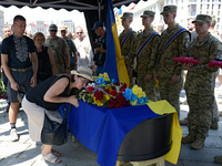 People are paying their last respects to the commander of the OUN volunteer battalion Mykola Kokhanivskyi, who died near Vovchansk in Kharki...