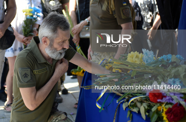 Servicemen are paying their last respects to the commander of the OUN volunteer battalion Mykola Kokhanivskyi, who died near Vovchansk in Kh...