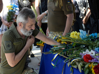 Servicemen are paying their last respects to the commander of the OUN volunteer battalion Mykola Kokhanivskyi, who died near Vovchansk in Kh...