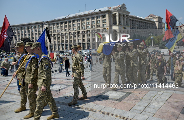 Servicewomen are carrying the coffin of the commander of the OUN volunteer battalion Mykola Kokhanivskyi, who died near Vovchansk in Kharkiv...