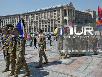 Servicewomen are carrying the coffin of the commander of the OUN volunteer battalion Mykola Kokhanivskyi, who died near Vovchansk in Kharkiv...