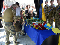 Servicemen are paying their last respects to the commander of the OUN volunteer battalion Mykola Kokhanivskyi, who died near Vovchansk in Kh...