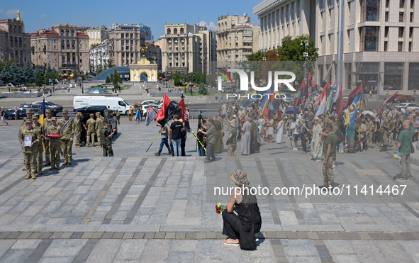 Servicewomen are carrying the coffin of the commander of the OUN volunteer battalion Mykola Kokhanivskyi, who died near Vovchansk in Kharkiv...