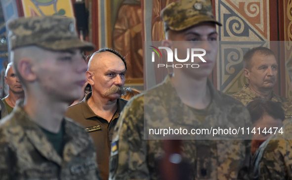 Servicemen are attending a memorial service for the commander of the OUN volunteer battalion Mykola Kokhanivskyi, who died near Vovchansk in...