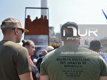 People are paying their last respects to the commander of the OUN volunteer battalion Mykola Kokhanivskyi, who died near Vovchansk in Kharki...