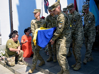 Servicemen are carrying the coffin of the commander of the OUN volunteer battalion Mykola Kokhanivskyi, who died near Vovchansk in Kharkiv r...