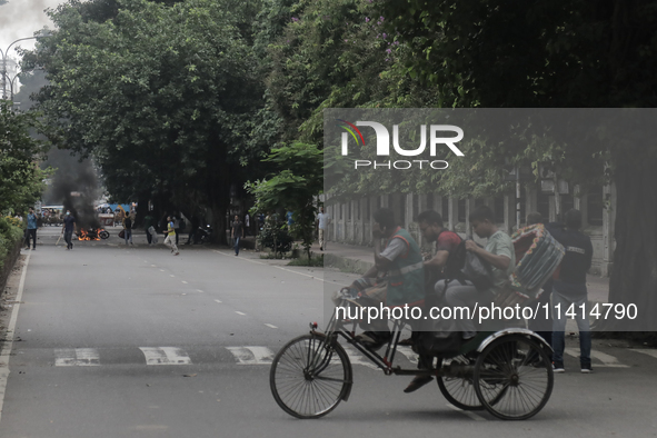 Students are leaving the Dhaka University dormitory as violence is erupting in Dhaka, Bangladesh, on July 17, 2024. 