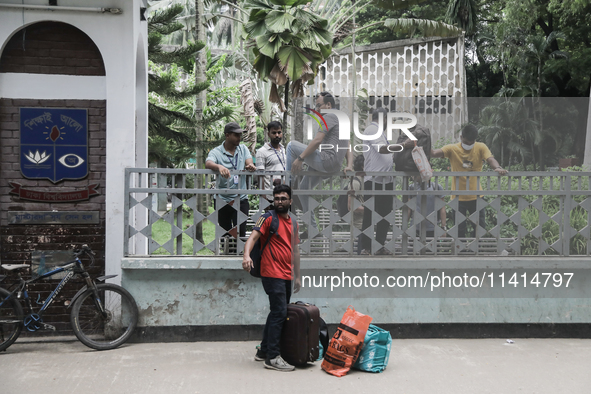 Students are leaving the Dhaka University dormitory as violence is erupting in Dhaka, Bangladesh, on July 17, 2024. 