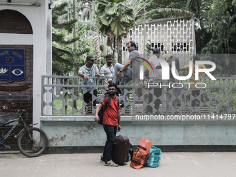 Students are leaving the Dhaka University dormitory as violence is erupting in Dhaka, Bangladesh, on July 17, 2024. (