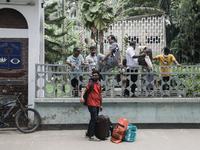 Students are leaving the Dhaka University dormitory as violence is erupting in Dhaka, Bangladesh, on July 17, 2024. (