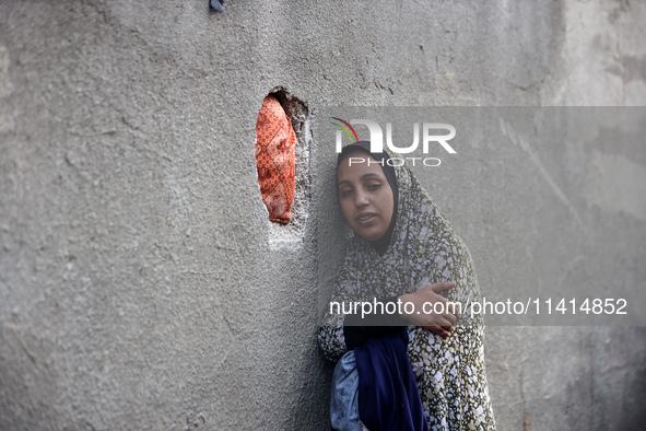 Palestinian women are reacting at the site of an Israeli strike on a house, in Nuseirat, central Gaza Strip, on July 17, 2024, amid the ongo...