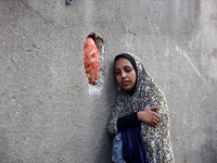 Palestinian women are reacting at the site of an Israeli strike on a house, in Nuseirat, central Gaza Strip, on July 17, 2024, amid the ongo...