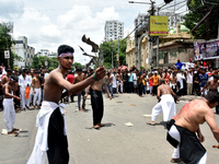 Shiite Muslims are flagellating themselves during a procession to mark Ashura in South Kolkata, India, on July 17, 2024. Ashura is the 10th...