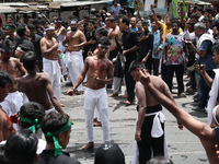 Shi'ite Muslims are flagellating themselves during a Muharram procession marking Ashura, in Kolkata, India, on July 17, 2024. (