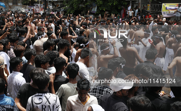 Shi'ite Muslims are flagellating themselves during a Muharram procession marking Ashura, in Kolkata, India, on July 17, 2024. 