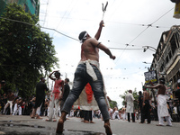 Shi'ite Muslims are flagellating themselves during a Muharram procession marking Ashura, in Kolkata, India, on July 17, 2024. (