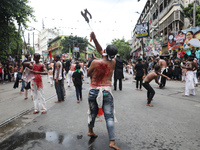 Shi'ite Muslims are flagellating themselves during a Muharram procession marking Ashura, in Kolkata, India, on July 17, 2024. (