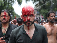 Shi'ite Muslims are walking after flagellating themselves during a Muharram procession marking Ashura in Kolkata, India, on July 17, 2024. (