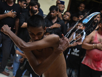 Shiite Muslims are flagellating themselves during a procession to mark Ashura, in the old quarters of New Delhi, India, on July 17, 2024. As...