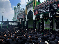 Shiite Muslim mourners are flagellating themselves on the tenth day of Ashura during the Islamic month of Muharram, commemorating the sevent...