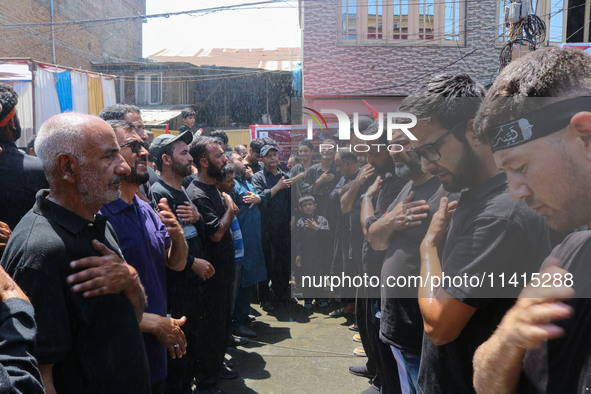 Kashmiri Shiite Muslim mourners are taking part in a religious procession on the tenth day of Ashura in the Islamic month of Muharram in Sri...