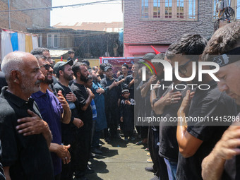 Kashmiri Shiite Muslim mourners are taking part in a religious procession on the tenth day of Ashura in the Islamic month of Muharram in Sri...