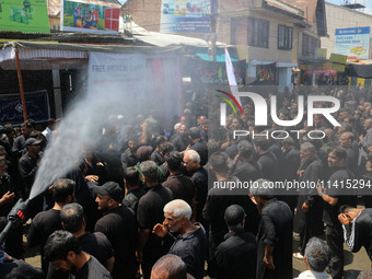 Kashmiri Shiite Muslim mourners are taking part in a religious procession on the tenth day of Ashura in the Islamic month of Muharram in Sri...