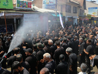 Kashmiri Shiite Muslim mourners are taking part in a religious procession on the tenth day of Ashura in the Islamic month of Muharram in Sri...