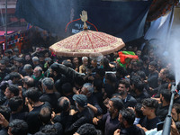 Kashmiri Shiite Muslim mourners are taking part in a religious procession on the tenth day of Ashura in the Islamic month of Muharram in Sri...