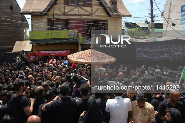 Kashmiri Shiite Muslim mourners are taking part in a religious procession on the tenth day of Ashura in the Islamic month of Muharram in Sri...