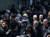 Kashmiri Shiite Muslim mourners are taking part in a religious procession on the tenth day of Ashura in the Islamic month of Muharram in Sri...