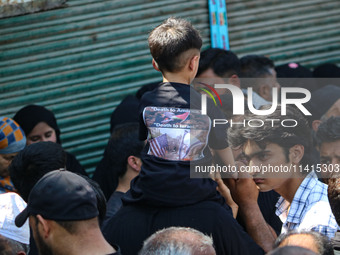 Kashmiri Shiite Muslim mourners are taking part in a religious procession on the tenth day of Ashura in the Islamic month of Muharram in Sri...