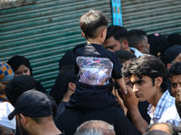 Kashmiri Shiite Muslim mourners are taking part in a religious procession on the tenth day of Ashura in the Islamic month of Muharram in Sri...