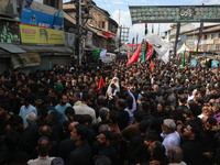 Kashmiri Shiite Muslim mourners are taking part in a religious procession on the tenth day of Ashura in the Islamic month of Muharram in Sri...