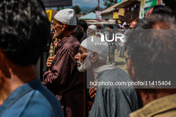 Kashmiri Shiite Muslims are chanting religious slogans as they take part in an Ashura procession during Muharram in Sopore, Jammu and Kashmi...