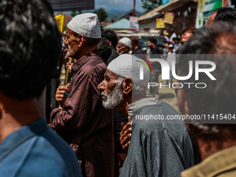 Kashmiri Shiite Muslims are chanting religious slogans as they take part in an Ashura procession during Muharram in Sopore, Jammu and Kashmi...