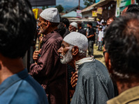 Kashmiri Shiite Muslims are chanting religious slogans as they take part in an Ashura procession during Muharram in Sopore, Jammu and Kashmi...