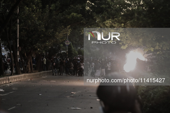 An explosion is being seen as anti-quota protestors are approaching the police in Dhaka, Bangladesh, on July 17, 2025. 